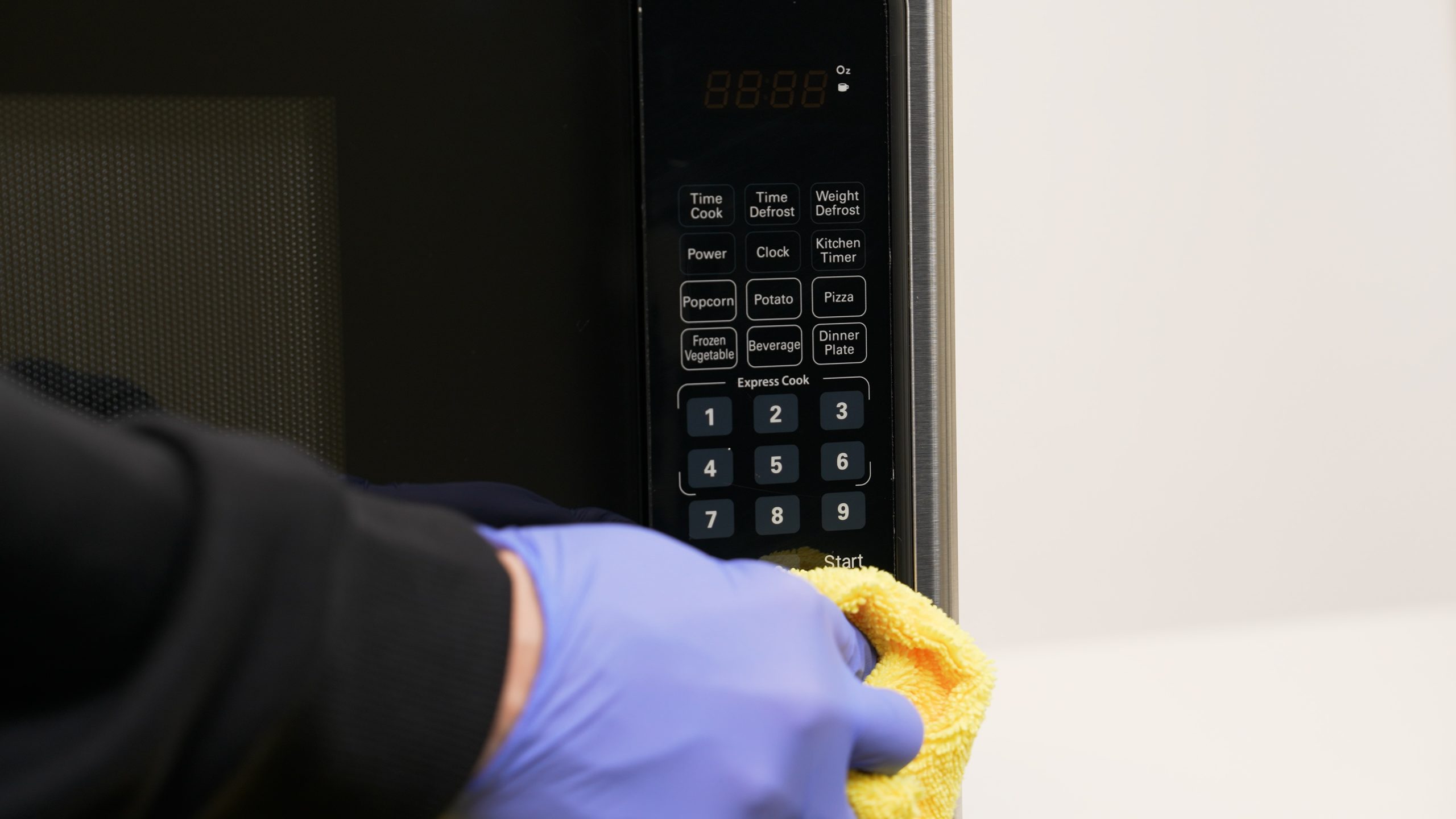 Common Areas That Need Regular Cleaning in Law Offices law office cleaning services - cleaning microwave in breakroom